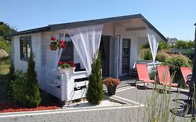 Domki LA MER USTKA z własnymi ogródkami- Balia z jacuzzi ,sauna ,rowery, klimatyzacja